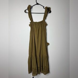 Maxi dress with feminine lace detailing at bottom and ruffle on straps.
